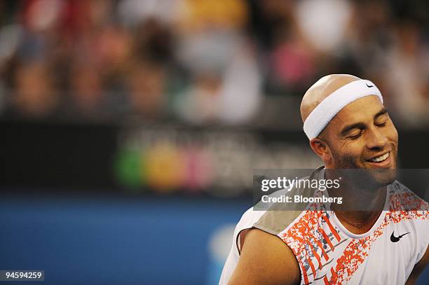 James Blake of the United States reacts after scoring a point against Michael Russell of the United States in a second round match on day four of the...