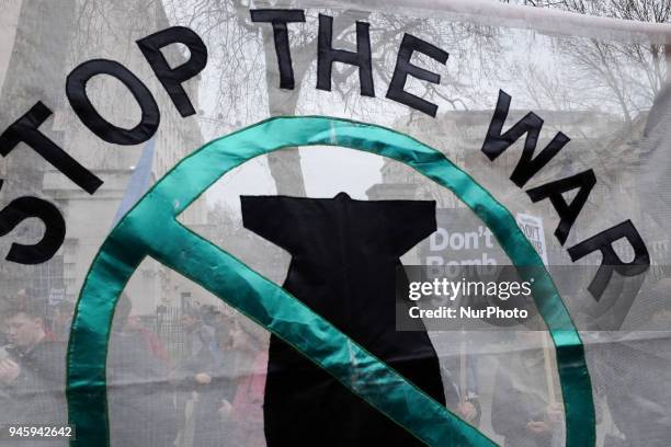 Stop the war coalition banner during the protest in London, UK, on 13 April 2018. Hundreds of people gather outside downing street to protest against...