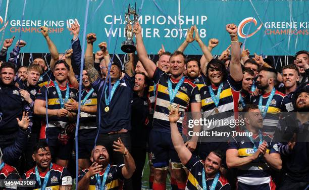 The Bristol Rugby side celebrate with the trophy after the final whistle during the Greene King IPA Championship match between Bristol Rugby and...