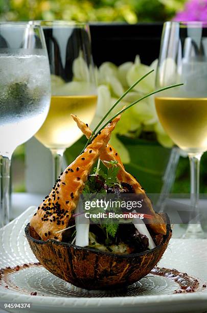 Salad of Alaskan king crab with kumquat confit, avocados and snow-pea leaves in chardonnay dressing is pictured at the "Flutes at the Fort"...