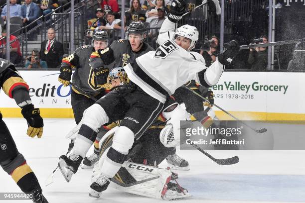 Dustin Brown of the Los Angeles Kings is called for a goalie interference penalty against Marc-Andre Fleury of the Vegas Golden Knights in Game One...