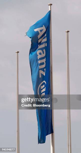 Company flag flies at the Allianz AG headquarters in Unterfoehring near Munich, Germany, Thursday, June 22, 2006. Allianz AG, Europe's largest...