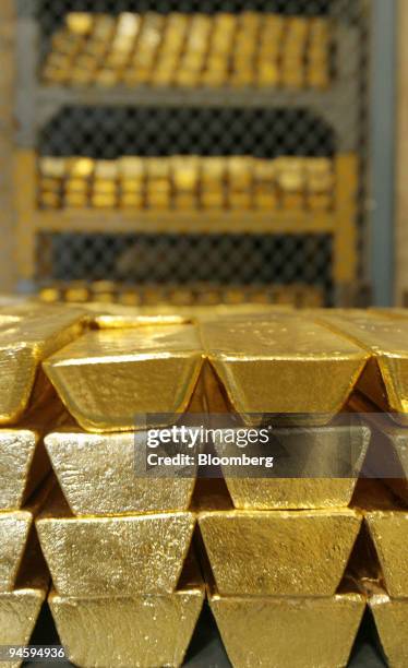 Stacks of 40 Troy ounce high fine gold bars are seen in a subcompartment of the vault inside the United States Mint in West Point, New York Tuesday,...