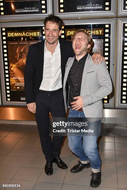 Oliver Mommsen and producer Adrian Topol during the premiere 'Die Haut der Anderen' at Kino in der Kulturbrauerei on April 13, 2018 in Berlin,...