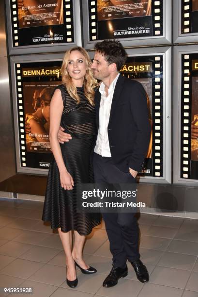 Isabel Thierauch and Oliver Mommsen during the premiere 'Die Haut der Anderen' at Kino in der Kulturbrauerei on April 13, 2018 in Berlin, Germany.