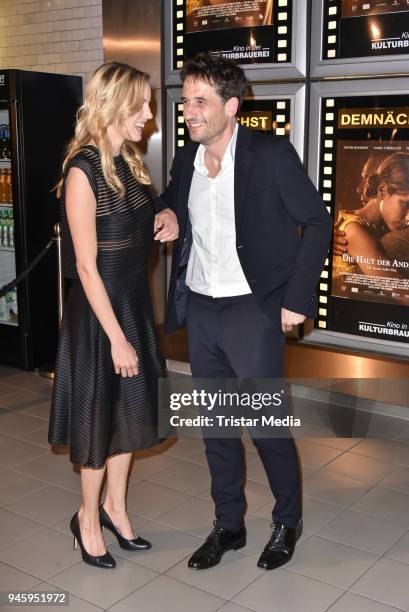 Isabel Thierauch and Oliver Mommsen during the premiere 'Die Haut der Anderen' at Kino in der Kulturbrauerei on April 13, 2018 in Berlin, Germany.