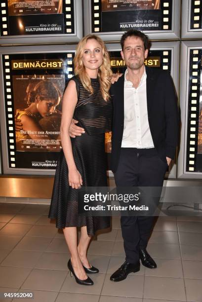 Isabel Thierauch and Oliver Mommsen during the premiere 'Die Haut der Anderen' at Kino in der Kulturbrauerei on April 13, 2018 in Berlin, Germany.