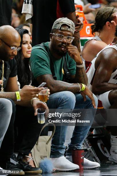 Denver Broncos linebacker Von Miller looks on during the first half between the Miami Heat and the Toronto Raptors at American Airlines Arena on...