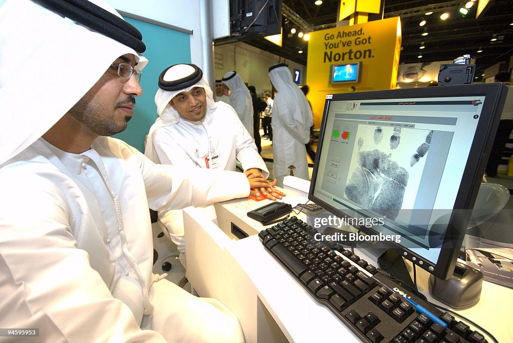 Mohamed Abdulla Ali Al Hamadi, left, of the Emirates Identit