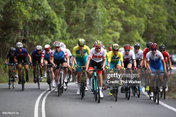 Competitors race during the Women's Road Race on day 10 of the Gold Coast 2018 Commonwealth Games at Currumbin Beachfront on April 14, 2018 in Gold...