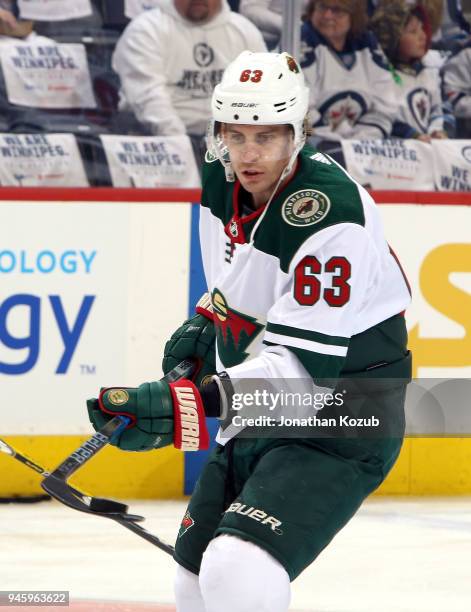 Tyler Ennis of the Minnesota Wild takes part in the pre-game warm up prior to NHL action against the Winnipeg Jets in Game Two of the Western...