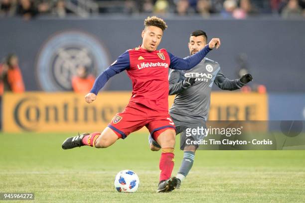 April 11: Adam Henley of Real Salt Lake challenged by Maximiliano Moralez of New York City during the New York City FC Vs Real Salt Lake regular...