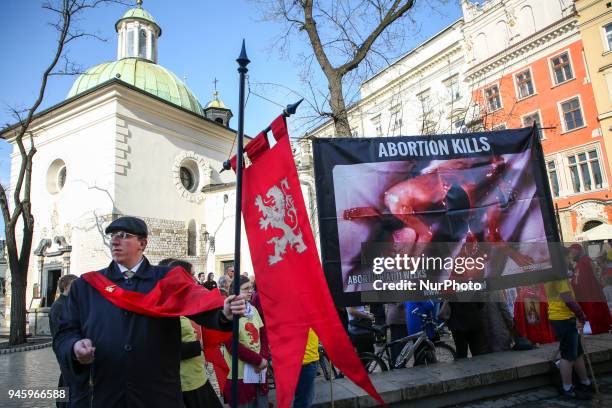Members of Rosary Crusade pray during a public rosary at the Main Square in Krakow, Poland on 14 April, 2018. Worshippers prayed for the moral...