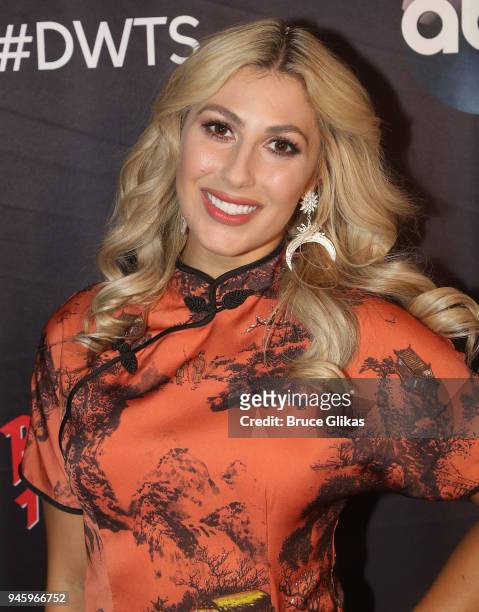 Emma Slater poses as the "Dancing with the Stars: Athletes Season 26" cast visits Planet Hollywood Times Square on April 13, 2018 in New York City.