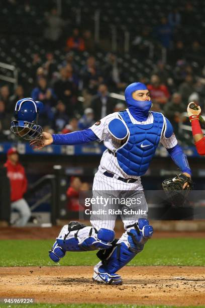 Travis d'Arnaud of the New York Mets in action against the Philadelphia Phillies during a game at Citi Field on April 3, 2018 in the Flushing...