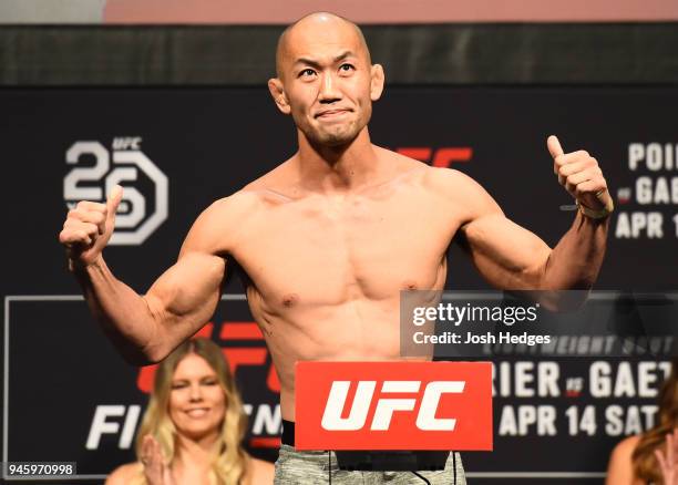 Yushin Okami of Japan poses on the scale during the UFC Fight Night weigh-in at the Gila Rivera Arena on April 13, 2018 in Glendale, Arizona.