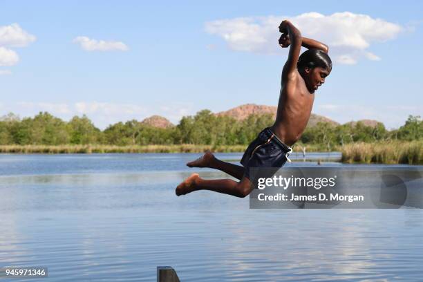 Locals enjoy a Sunday afternoon off jumping into the Lake and fishing in one of the river crossings close to the town on September 25, 2016 in...