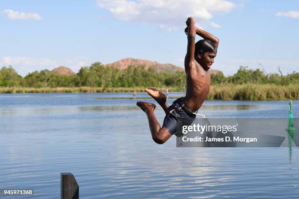 Locals enjoy a Sunday afternoon off jumping into the Lake and fishing in one of the river crossings close to the town on September 25, 2016 in...