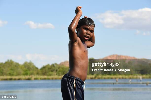 Locals enjoy a Sunday afternoon off jumping into the Lake and fishing in one of the river crossings close to the town on September 25, 2016 in...