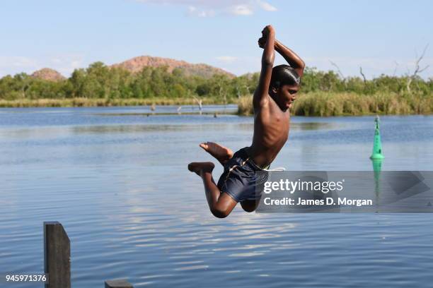 Locals enjoy a Sunday afternoon off jumping into the Lake and fishing in one of the river crossings close to the town on September 25, 2016 in...