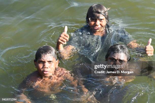 Locals enjoy a Sunday afternoon off jumping into the Lake and fishing in one of the river crossings close to the town on September 25, 2016 in...