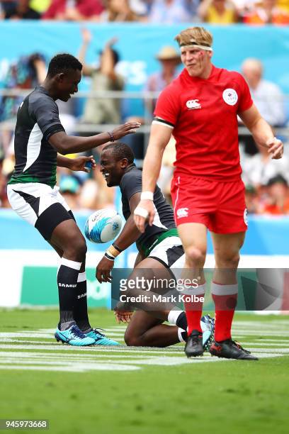 William Ambaka Ndayara of Kenya celebrates scoring a try during the Rugby Sevens match between Kenya and Canada on day 10 of the Gold Coast 2018...