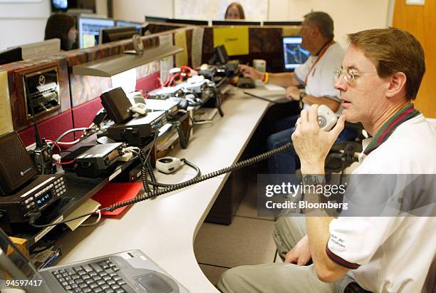 Rick Sagers operates a ham radio at the National Weather Service forecast office in Fort Worth, Texas, Monday, June 26, 2006.