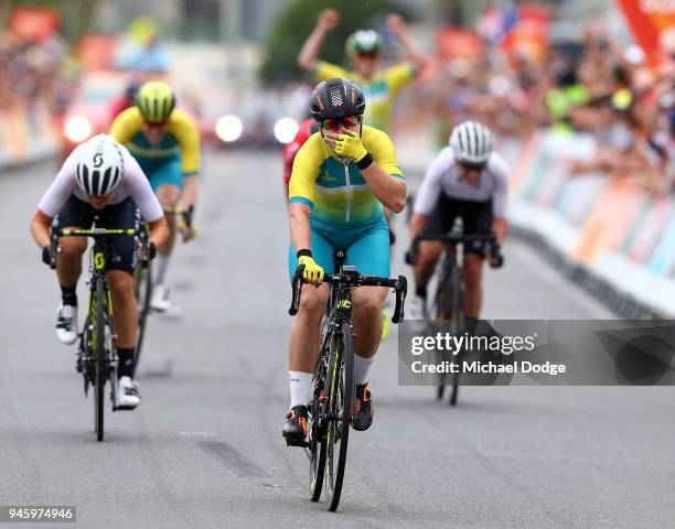 Chloe Hosking of Australia celebrates victory in the Women's Road Race on day 10 of the Gold Coast 2018 Commonwealth Games at Currumbin Beachfront on...