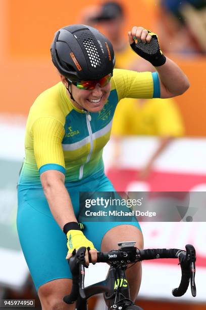 Chloe Hosking of Australia celebrates victory in the Women's Road Race on day 10 of the Gold Coast 2018 Commonwealth Games at Currumbin Beachfront on...