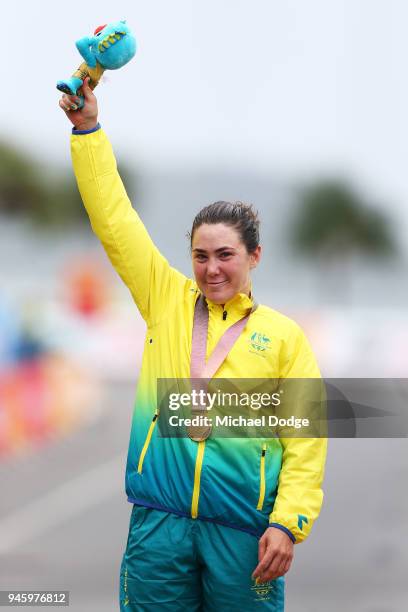 Gold medalist Chloe Hosking of Australia poses during the medal ceremony for the Women's Road Race on day 10 of the Gold Coast 2018 Commonwealth...