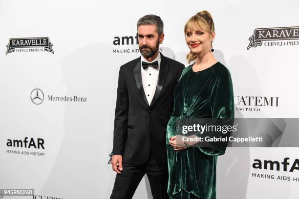 Augusto Arruda and Ana Claudia Michels attend the 2018 amfAR gala Sao Paulo at the home of Dinho Diniz on April 13, 2018 in Sao Paulo, Brazil.