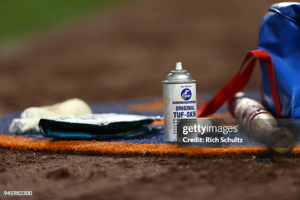 Batting accessories sit in the on deck circle during a game between the Philadelphia Phillies and New York Mets at Citi Field on April 3, 2018 in the...