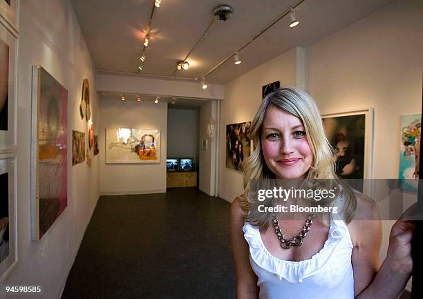 Amy Smith-Stewart, owner of Smith-Stewart Gallery, poses in her space, located at 53 Stanton Street on the Lower East Side of New York, Saturday,...