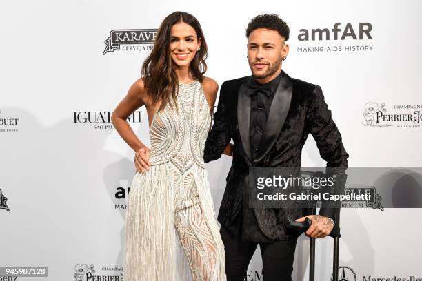 Bruna Marquezine and Neymar Jr. Attend the 2018 amfAR gala Sao Paulo at the home of Dinho Diniz on April 13, 2018 in Sao Paulo, Brazil.