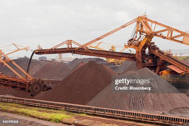 Conveyor belts transport mounds of iron ore to a stockyard at the Ponta da Madeira Maritime Terminal, owned by mining company CVRD in the state of...