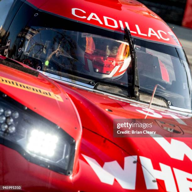 The Cadillac DPi, of Eric Curran and Felipe Nasr, of Brazil, races on the track during practice for the IMSA Buba Burger Grand Prix of Long Beach on...