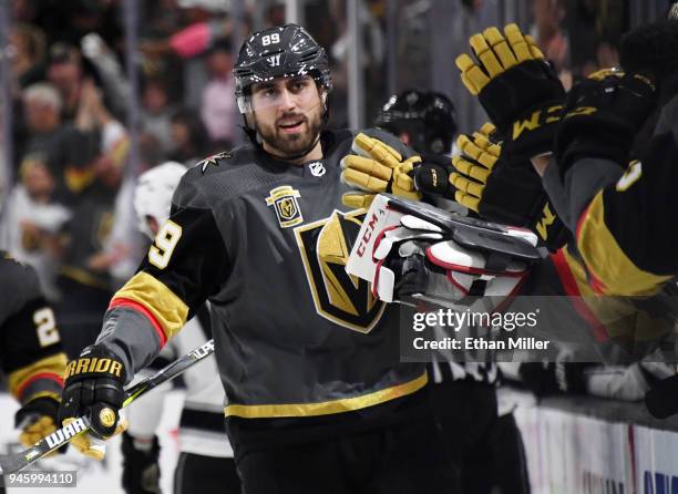 Alex Tuch of the Vegas Golden Knights celebrates with teammates on the bench after he scored a power-play goal against the Los Angeles Kings in the...