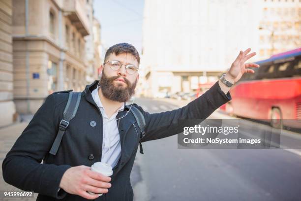 handsome young architect commuting to work - car blueprint stock pictures, royalty-free photos & images