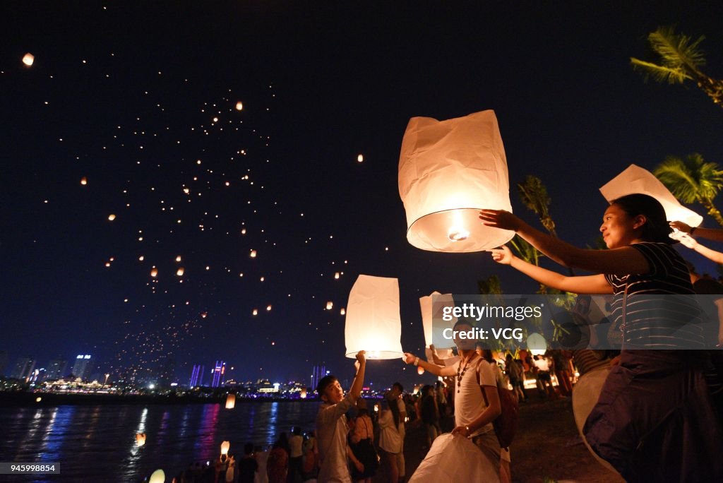 Kongming Lanterns Lit To Celebrate Water-Sprinkling Festival In Xishuangbanna