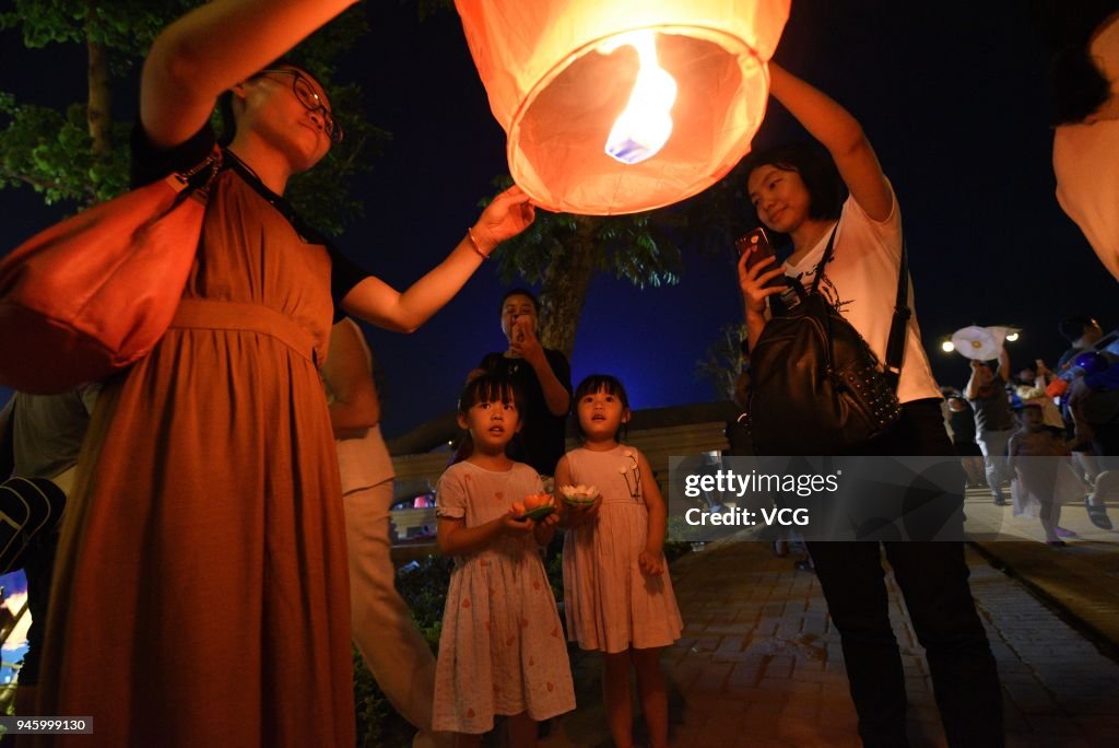 Kongming Lanterns Lit To Celebrate Water-Sprinkling Festival In Xishuangbanna