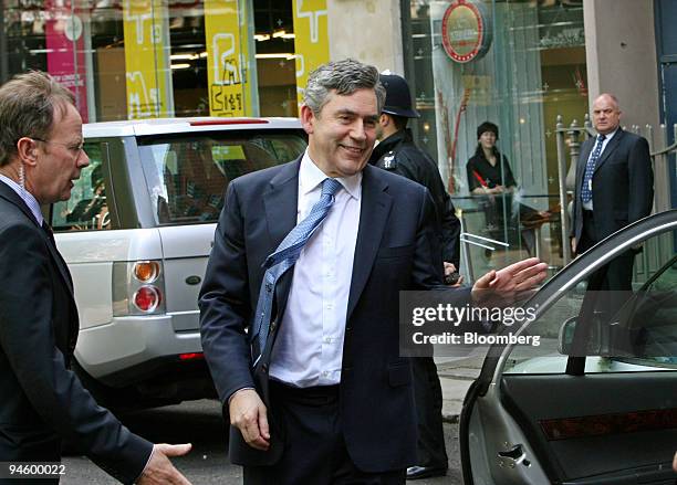 Gordon Brown, U.K. Chancellor of the Exchequer, smiles while getting into his car after launching his campaign for prime minister, in London, U.K.,...