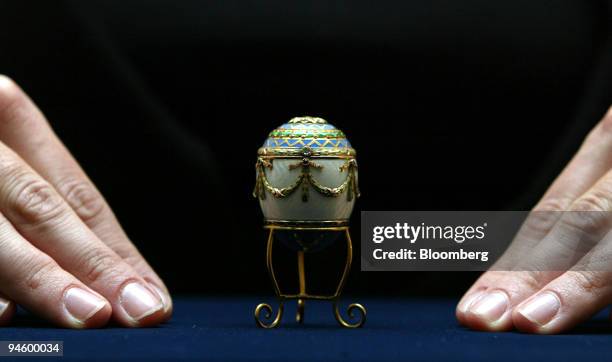 Faberge enamel and two colour gold egg bonbonniere, estimated price ?30-50,000 - US$ 59-97 is displayed at Christie's auction house in London, U.K.,...