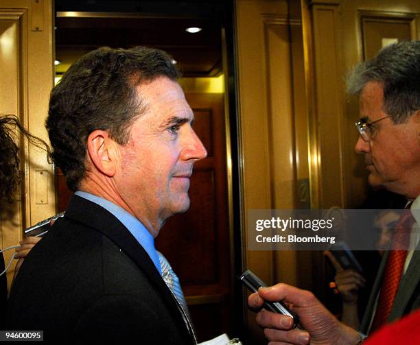 South Carolina Senator Jim DeMint, left, discusses immigration reform outside the U.S. Senate chambers in Washington, D.C., on June 26, 2007. The...