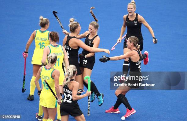 Shiloh Gloyn of New Zealand is congratulated by her teammates after scoring the first goal during the Women's Gold Medal match between Australia and...