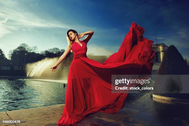 so attractive - red dress model stock pictures, royalty-free photos & images