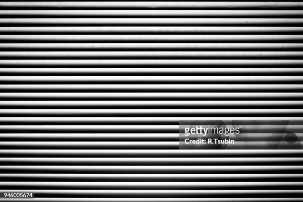 shutter door texture - iron roll stock pictures, royalty-free photos & images