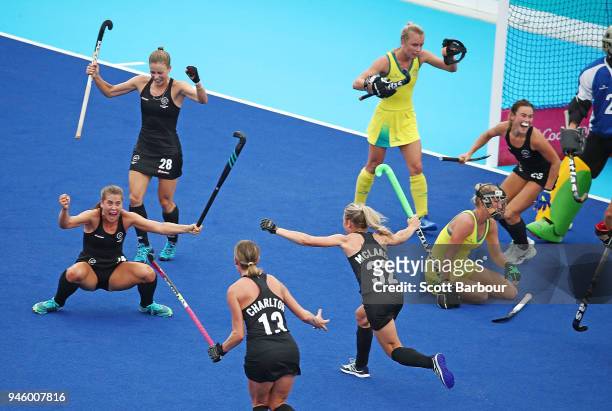 Rose Keddell of New Zealand is congratulated by her teammates after scoring their second goal during the Women's Gold Medal match between Australia...