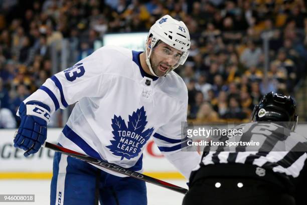 Toronto Maple Leafs center Nazem Kadri argues with linesman Mark Shewchyk after being waved out of the face off circle during Game 1 of the First...