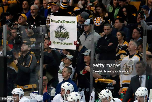 Fan with a sign of support for the Humboldt Broncos during Game 1 of the First Round for the 2018 Stanley Cup Playoffs between the Boston Bruins and...