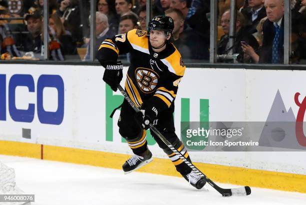 Boston Bruins left defenseman Torey Krug fires a pass up ice during Game 1 of the First Round for the 2018 Stanley Cup Playoffs between the Boston...